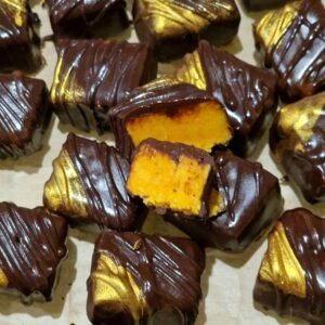 Apelsini komm tumeda šokolaadiga.